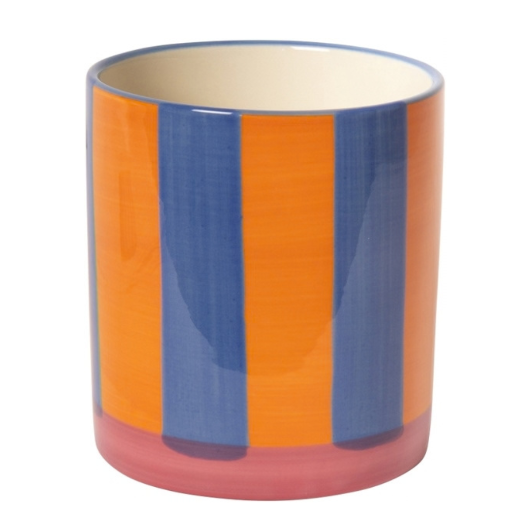 A cylindrical ceramic houseplant pot or small vase for flowers with vertical stripes in orange, blue, and pink, featuring a cream-colored interior, shown on a plain white background.